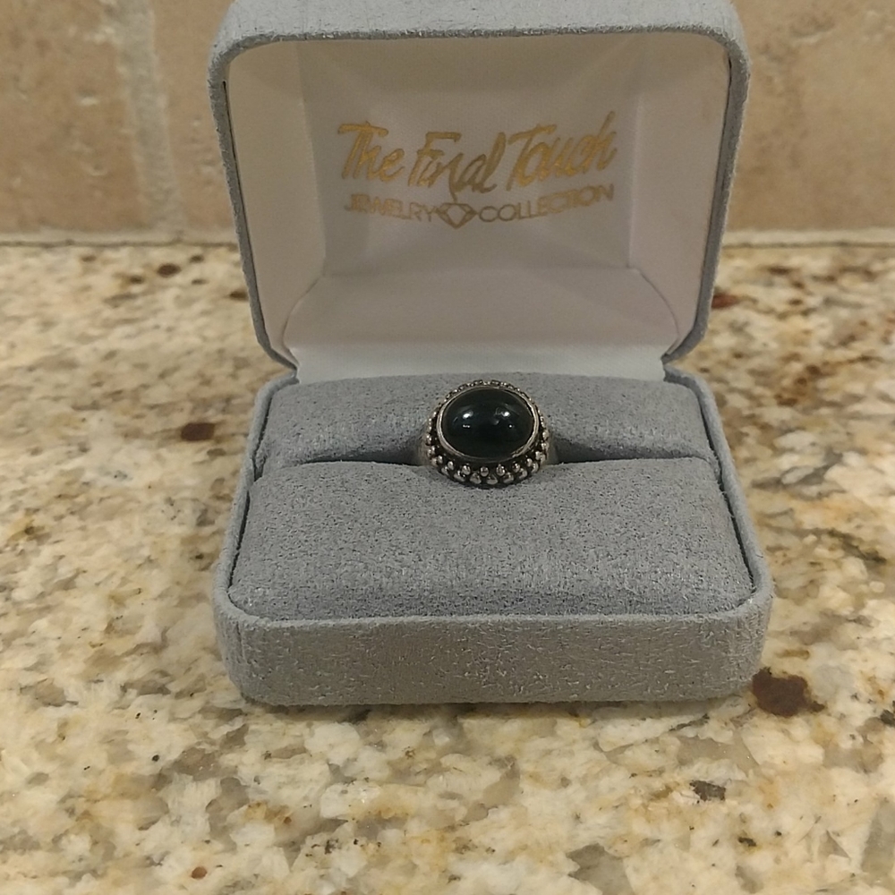 Black and silver ring